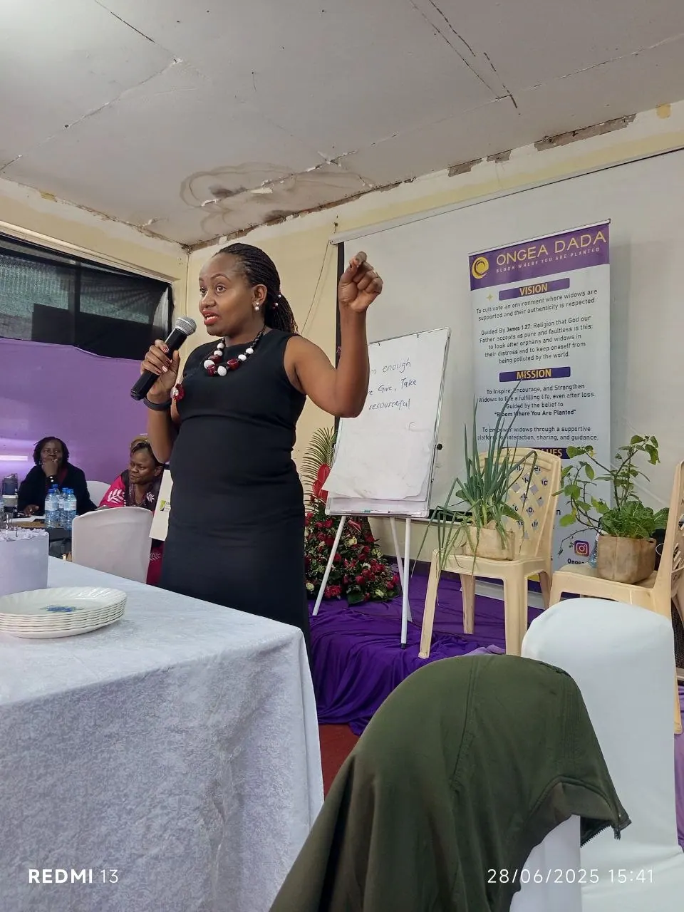 Mercy Munene leading a farmer training session